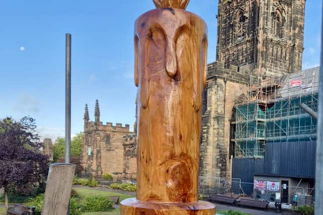 The sculpture reflects the motto of Wolverhampton "Out of darkness, cometh light"