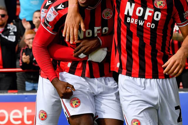 Daniel Kanu celebrates Walsall's winning goal.