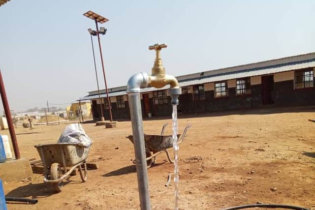 The new water tower provides fresh water for the 400 pupils.