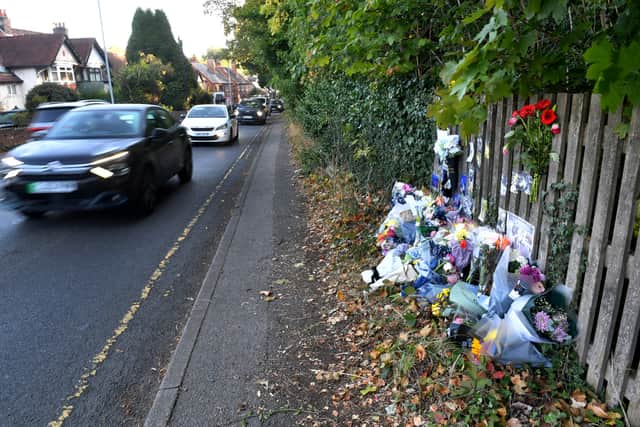 Dozens of tributes were left at the scene of where the fatal collision happened