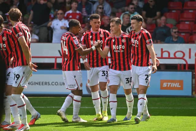 Walsall celebrate Evan Weir's opener against Swindon on the opening weekend of the League Two season.