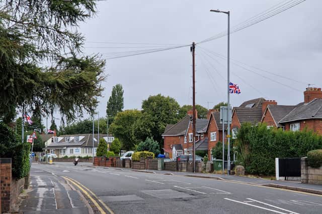 Plenty of flags have appeared on Harden Road, Leamore, where a pedestrian crossing had also been painted