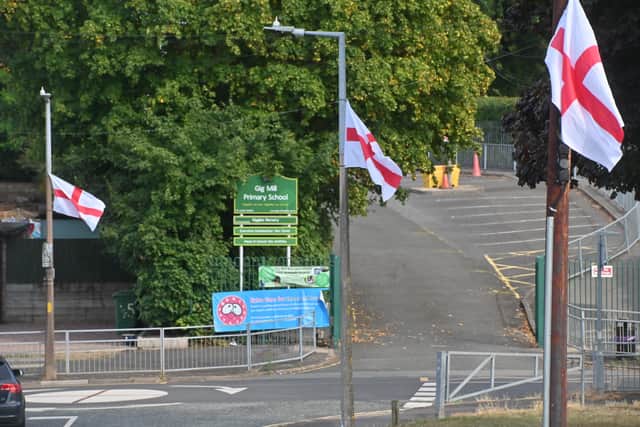 DUDLEY COPYRIGHT NATIONAL WORLD STEVE LEATH 21/08/25 Another view of the three flags flying close to each other in the Shenstone Avenue, Norton area.