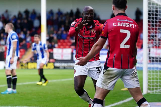 Walsall's Albert Adomah celebrates his goal against Colchester United last year.