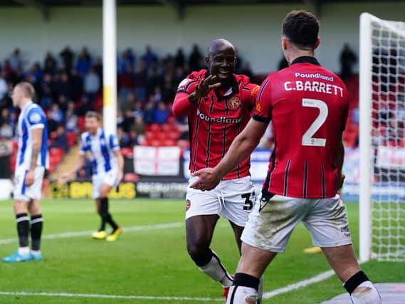 Walsall's Albert Adomah celebrates his goal against Colchester United last year.