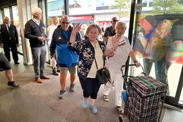The opening of the market was met with cheers from everyone entering. Photo: Steve Leath