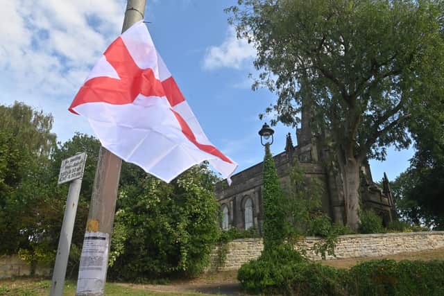 DUDLEY COPYRIGHT NATIONAL WORLD STEVE LEATH 21/08/25 A flag close to one of the main churches in Sedgley.