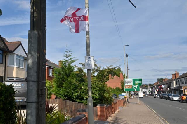 DUDLEY COPYRIGHT NATIONAL WORLD STEVE LEATH 21/08/25Flags and an island were decorated in the Stourbridge area. This is approaching Wollaston's main shopping street.