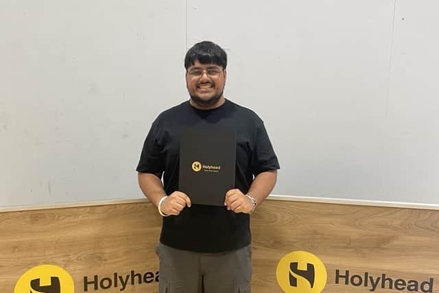 Sukhraj Athwal collects his A level results at Holyhead School