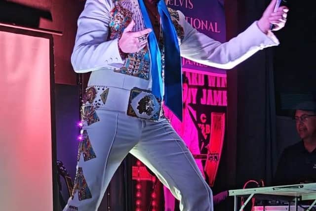 Andy James as Elvis