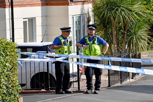 A heavy police presence was still visible at the site