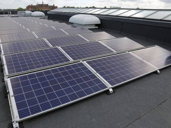 Solar panels on the roof of a new school in Hornechurch, east London (PA)