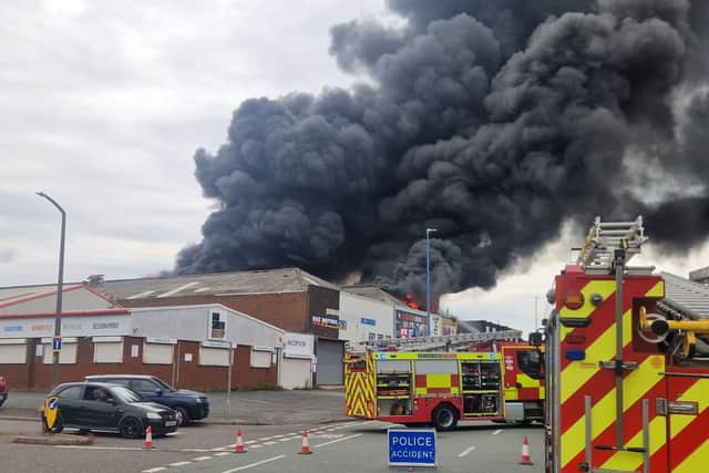 Homes evacuated as more than 100 firefighters tackled huge blaze in ...