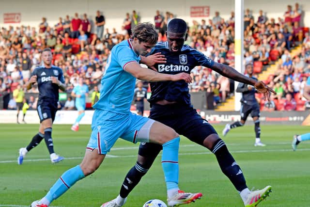 Aaron Pressley in action against Aston Villa.