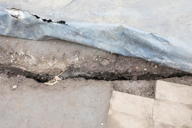 Residents claim the cracks in their walls and ground are caused by nearby work for the Brierley Hill Metro Extension line.