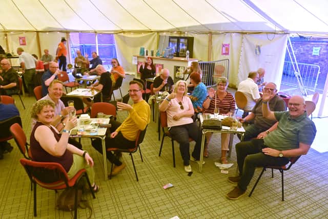The marquee outside was a popular place to get out of the sun
