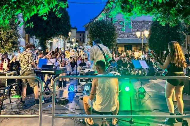 Musical students performing on Lake Garda. Photo: SAET