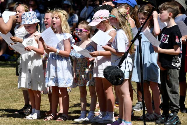 Children performing for the crowd