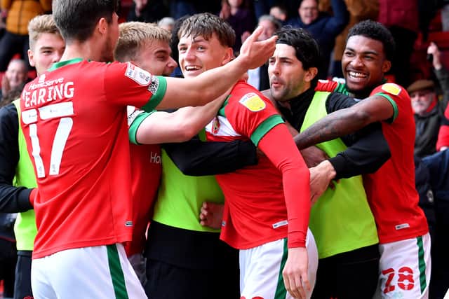 Former Walsall midfielder Sam Perry celebrates his goal against local rivals Port Vale in 2022.