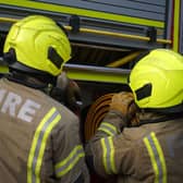 Firefighters rush to a car fire in Bridgnorth. Photo: Victoria Jones/PA