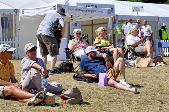 People sunbathing at the Newport Show 2025.
