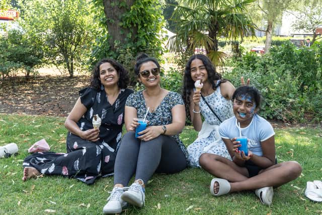 Spectators cool off in the shade with ice cream and slushies Credit: Ian Knight / Z70 Photography