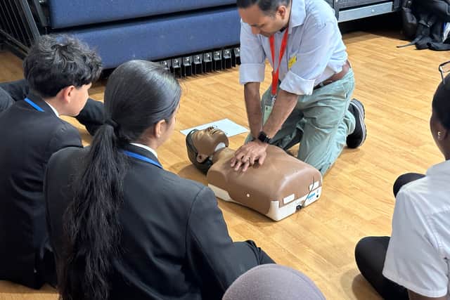 Staff from the Emergency Department at the Midland Met demonstrated how to perform chest compressions