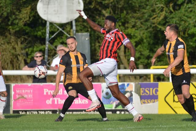 Walsall striker Jamille Matt controls the ball.
