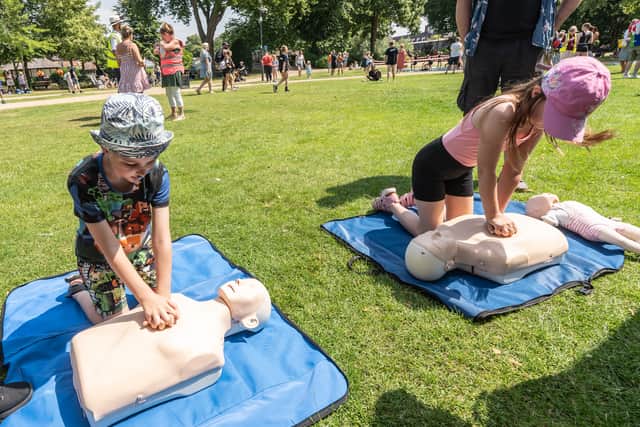 Children learn CPR Credit: Ian Knight / Z70 Photography