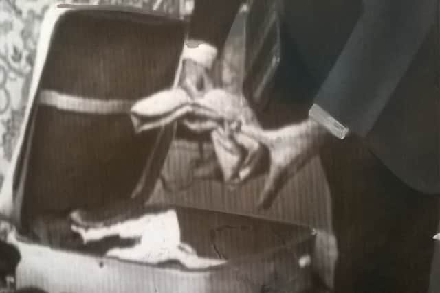 John Stonehouse packing his bags ready to face the music in Britain