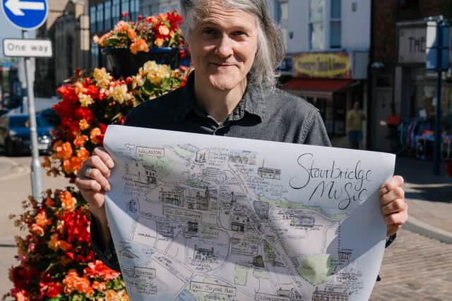 Jonn Penney of Neds Atomic Dustbin holds the Stourbridge Music Map. Photo: Jenny Edwards Photography 