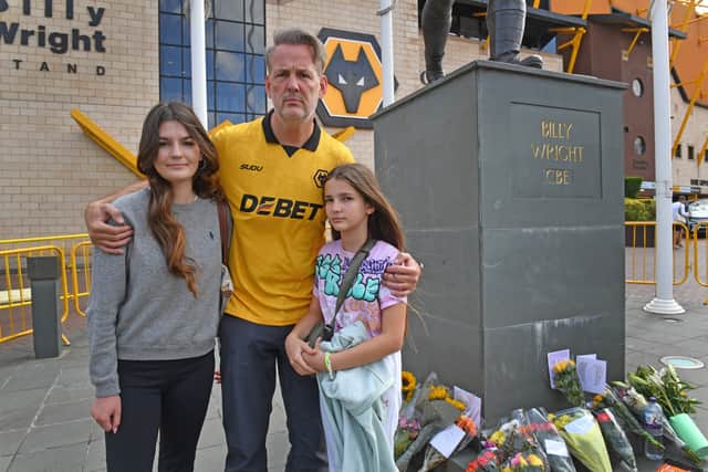 Peter, Dilara and Sara Coles were some of the first supporters to arrive at Molineux this morning