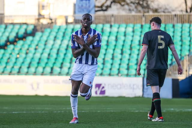 Eseosa Sule celebrating the first of his double. Pic: Gareth Evans Photography.