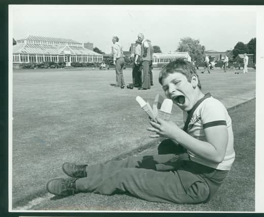 Darren Willetts kept cool with an ice cream or three during the heatwave of July, 1983, while the older generation played bowls at Victoria Park, Stafford
