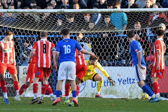 Charles Wragg scores to equalize for Halesowen against Stourbridge.