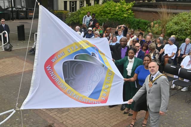 The Windrush flag is raised at Wolverhampton Civic Centre (R-L). Mayor: Craig Collinswood , Simone Stewart (guest speaker), Deputy Lord Lieutenant of the West Midlands Sandra Samuels OBE; Bishop Ruben King.