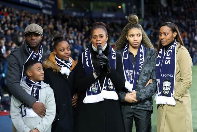 Julia Regis widow of Cyrille Regis with her family (AMA)