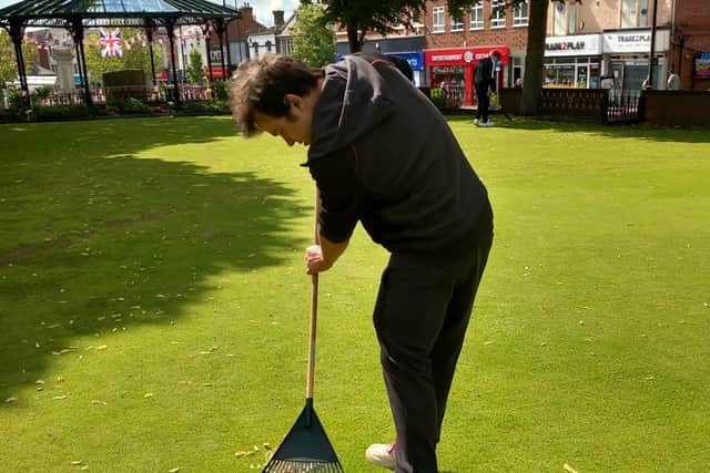 Students undertaking green maintenance