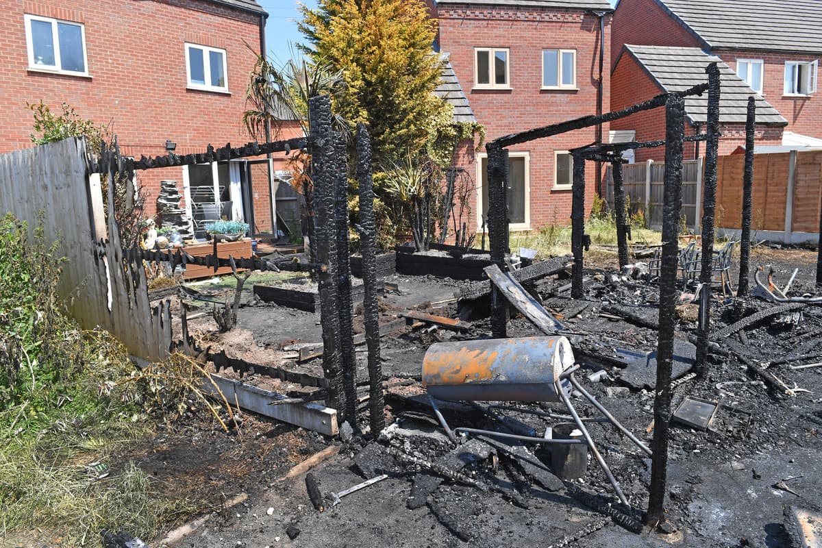 Shed Exploding From Front Devastation as fire destroys a garden shed and four people free ...
