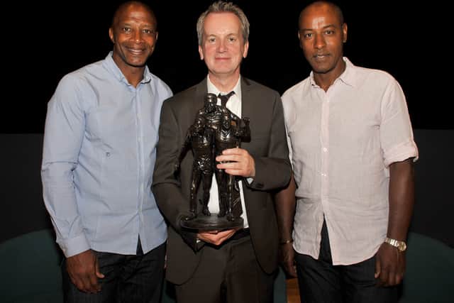 Cyrille Regis, Frank Skinner and Brendon Batson with a model of the Three Degrees statue