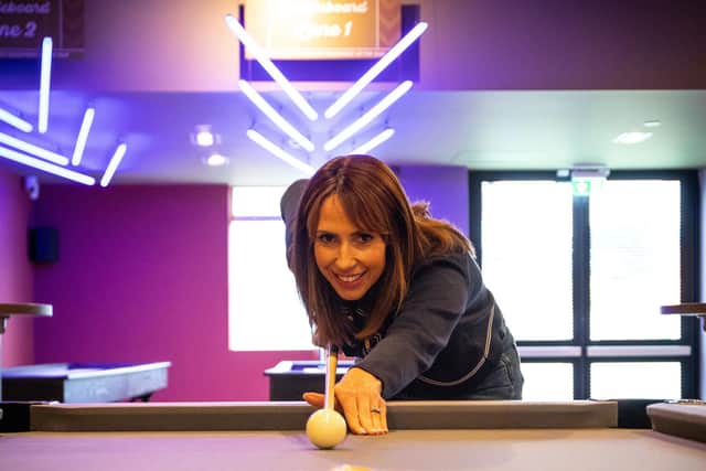 A game of pool in the new Sports Cafe for Alex Jones at Unity Beach.