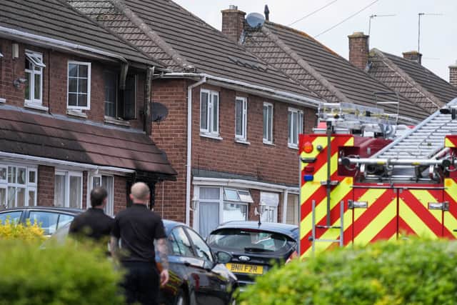 Emergency services at the scene in Plascom Road Photo: PA