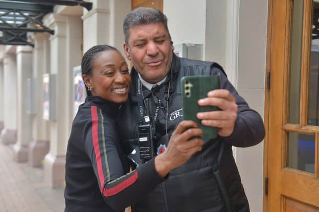 Beverlu Knight  poses for a selfi with The Grand security officer Mustafa Talbi.
