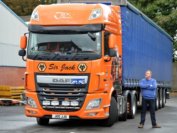 John Joseph Donovan at JJX Logistics in Kingswinford with a truck painted in honour of former Wolves club president Sir Jack Hayward