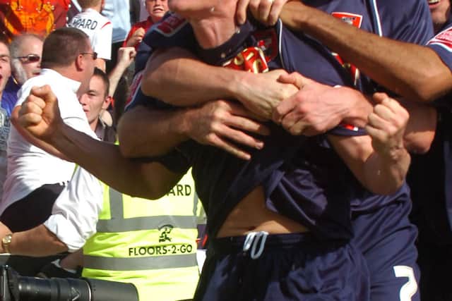Dean Keates celebrating his title-winning strike for Walsall in 2007.