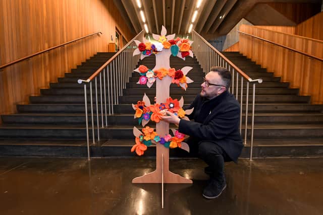 Councillor Garry Perry next to the Tree of Hope at New Art Gallery, Walsall.