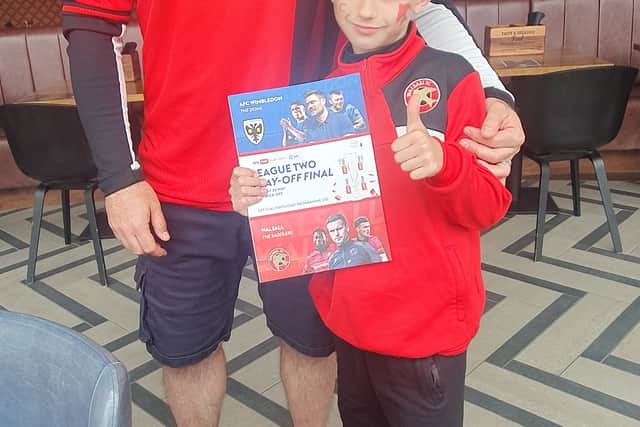 Ralph Buster, pictured with his dad Greg Allsopp, said he thought the Saddlers would win 5 or 6-0