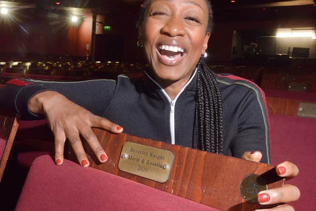 All smiles: Beverley Knight with the seat at The Grand Theatre, Wolverhampton which bears her name