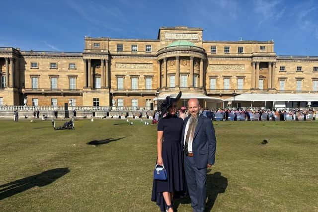 Mr Pitt and his wife at Buckingham Palace