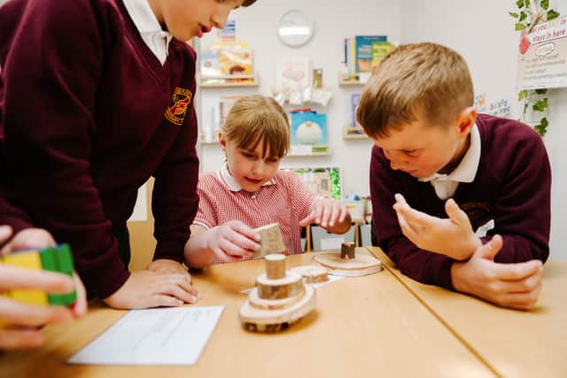 Pupils are encouraged to help each other while 'growing together'